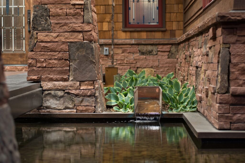 The Springs at QMR - waterfall feature in pond