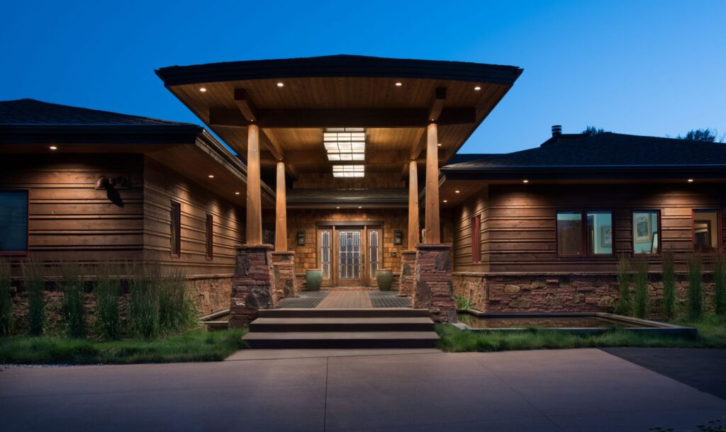 The Springs at QMR - view of front door at night