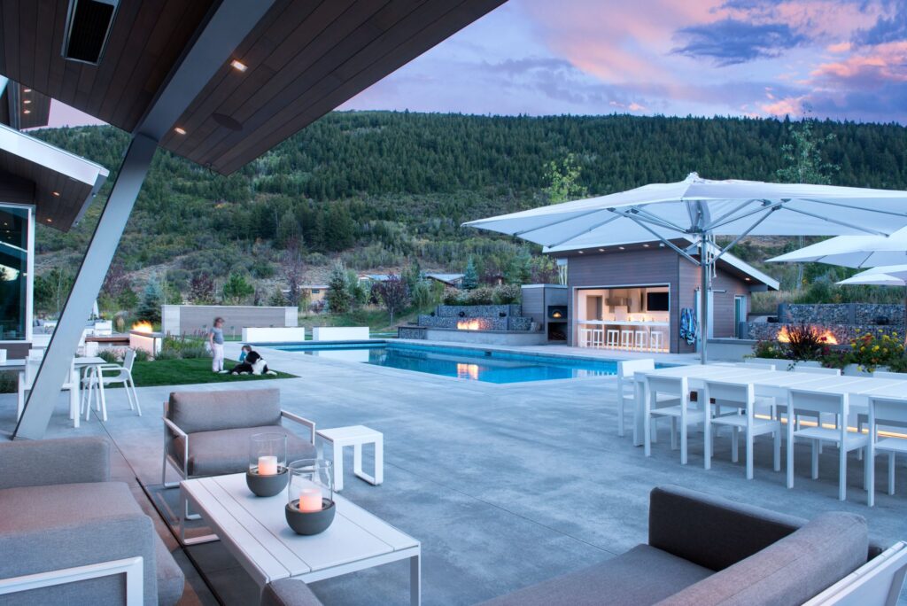 Zamboni Dreams - seating area in patio next to pool